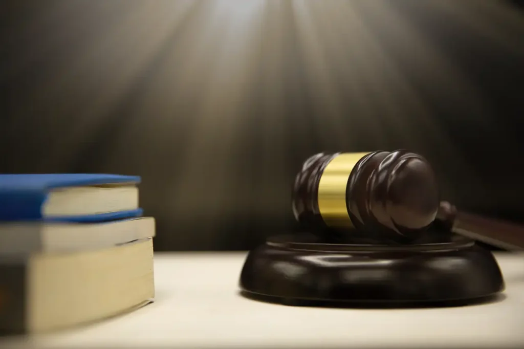 Judge’s gavel and law books representing legal justice and court proceedings.