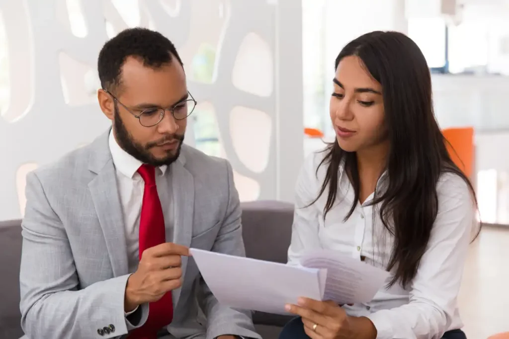 Probate Matters Client reviewing probate and estate documents with a lawyer during a legal consultation.