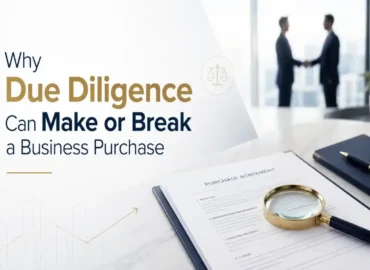 Business purchase agreement with magnifying glass and handshake in a professional office.